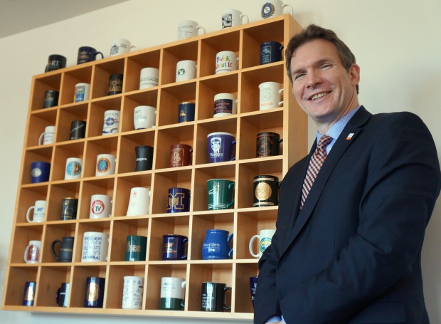 Langara president Dr. Lane Trotter has been collecting mugs for 20 years with over 300 in his collection, all of which come from educational institutions.(Karly Blats)